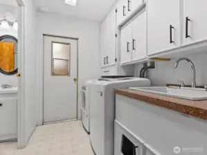 The laundry room is also conveniently located near both bedrooms.