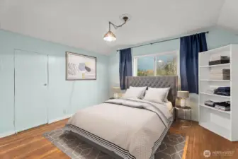 Spacious upstairs bedroom with ample double closet space and stunning mountain views.