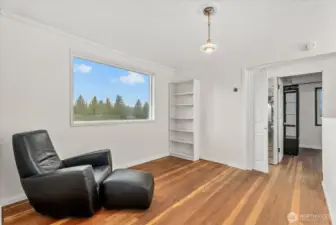 Generous bonus space in the upstairs landing is filled with light and glorious views.