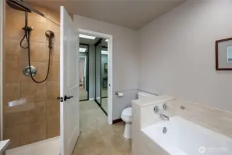 Primary bathroom w/tiled shower & floors