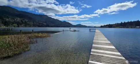 Private dock access on Lake Samish included with space rent, offering waterfront lifestyle without the waterfront price