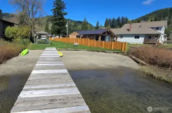 Expansive Lake Samish and mountain views highlight the natural beauty surrounding this Whatcom County location