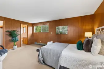 Another view of the Primary Bedroom. The door to the left is a walk-in closet; center doorway leads to the 3/4 ensuite bathroom.