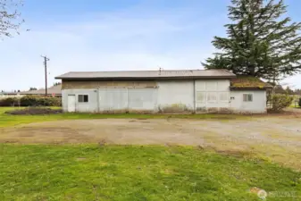 This is the shop! It's approximately 75'x25' and a newly installed electrical panel.