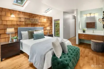 Primary bedroom with skylights.