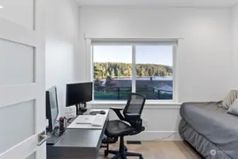 This main floor office is the perfect size. Getting your work done here won't feel like such a chore when you have a view like this to grace your day. Add a futon or daybed and "voila" extra space for guests.