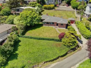 Great shot of this huge property in a great Seattle neighborhood! Enjoy several amenities nearby: The Seattle Library, Dick's Drive In, grocery and drug stores, a variety of restaurants and taverns, and the Northgate light rail station for commuting.