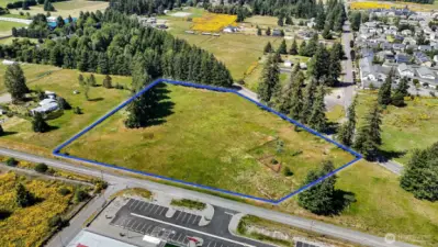 Property used to have an old home it that was removed. Make use of the utilities on site: well, septic, power. Blue boundary lines are approximate. Buyer to verify to their own satisfaction.