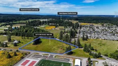 Property has road frontage on both Yelm Ave and 93rd. Blue boundary lines are approximate. Buyer to verify to their own satisfaction.