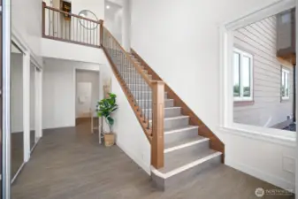 spacious entry with dual coat closets.