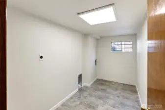 Recently completed finished space for laundry room
