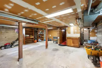 Look at this space in the oversized two car garage!!!
