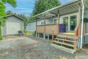 Additional parking off covered porch.