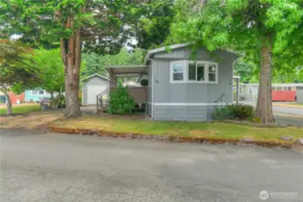 Front street view.  Over-sized corner lot.