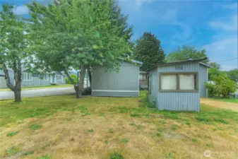 View from rear of home.  Large law space and garden shed.