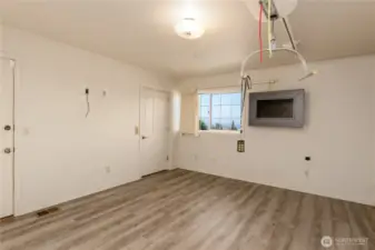 Primary bedroom with elevator and backyard access