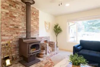 Recently serviced and cleaned the free-standing wood stove will provide comfortable heat all Winter long and keep your power bills low.