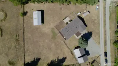 Nearly one acre of level, fenced land offers endless possibilities—from gardens and play areas to outdoor entertaining spaces. Privacy and room to roam are yours to enjoy.