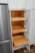 Lots of custom cabinetry with pull outs.
