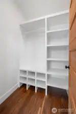 Custom cabinetry in the primary bedroom closet