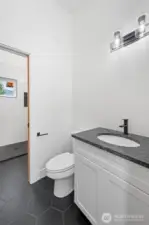 Downstairs bathroom with in-floor heating.