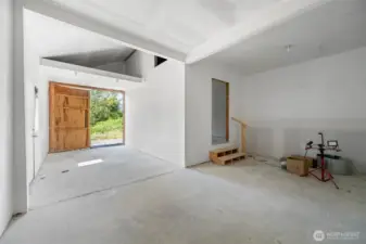 Large shop with electric, 3 storage loft and an office.