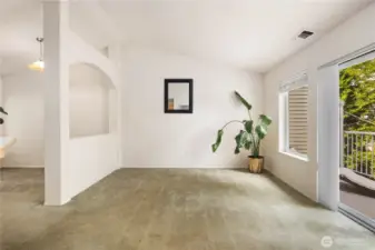 Living & Dining Flow: Vaulted ceilings and abundant natural light highlight the seamless connection between living and dining areas. The open pass-through design enhances flow and function, creating a bright, welcoming space for everyday living and entertaining.