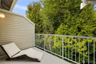 Private Deck: Serene deck retreat with full greenbelt views, offering unmatched privacy and space for outdoor relaxation.