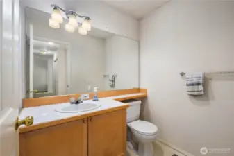 Second Bathroom: Full guest bath with neutral finishes, located near the second bedroom for comfort and accessibility.