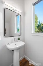Half bath off entrance from garage.