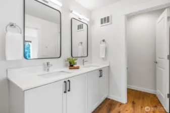 Primary bath w/separate toilet room.