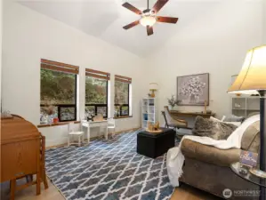 The room at the left of the entrance can be a formal living room or an office; you choose.