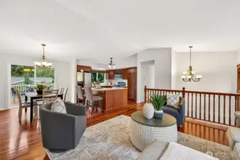 Here’s the heart of the home, an open living concept that keeps everyone connected, from the fireplace to the dining area to the kitchen. You’ll love the warm wood cabinetry, generous counter space, and stainless appliances, including a newer Bosch dishwasher that supports busy routines. The island adds prep space and a natural spot to gather, making it easy to cook, serve, and stay part of the conversation.