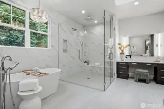 Heated floors, oversize shower with multiple shower heads, and large soaking tub.
