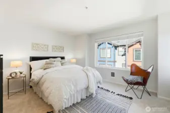 Primary bedroom is very spacious and has a lot of natural light.