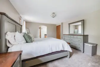 Oversized primary bedroom ready for your Queen or King-sized bed comfortably