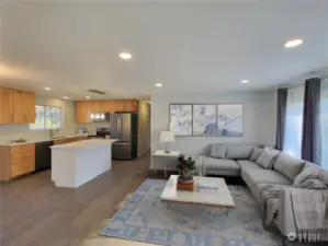Light filled open concept living/kitchen/dining to right upon entry. VIRTUALLY STAGED TO SCALE