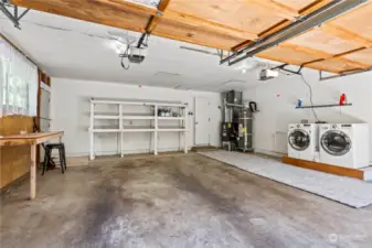 2 car garage with shelving.