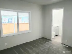 Another View of the Large Second Bedroom with New Paint , Carpet, Carpeting Showing Entry into Separate Bathroom.