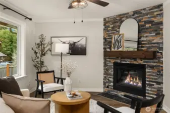 Updated fireplace surround gives a stylish ambiance to the entire room.