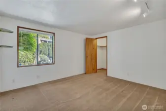 Versatile secondary bedroom ready to be customized for guests, work-from-home, or hobbies.