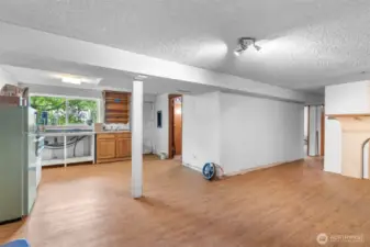 Are you looking for rental income, or for a multi-generational living style? This is it! Separate exterior access plus Kitchen, Living, two bedrooms, and a bath.