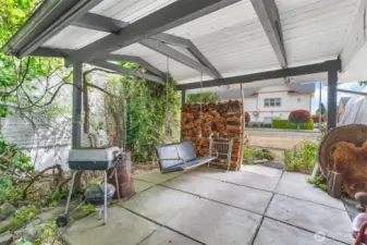 Enjoy the outdoors whatever the weather on covered patio.