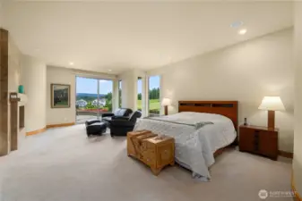 The primary suite offers an abundance of space, a lovely gas fireplace, walk-in closet, and private access to the patio on the golf course side. This spacious residence has everything to offer.