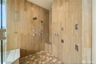The spa-like shower will impress with its multiple jets and a built-in bench.