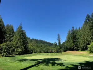 The home overlooks the right side of the 15th fairway.