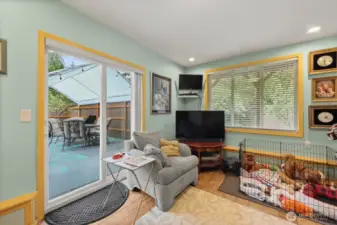 Slider off the family room to the backyard, pool and spa