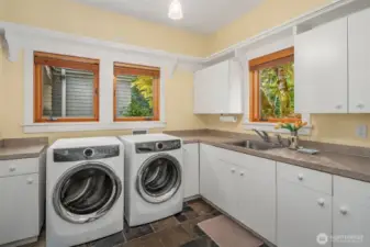 Main floor laundry with laundry shoot