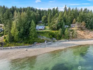 Aerial view of water and the property.