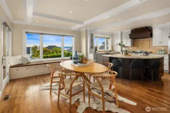 Utilizing the built-in seating and with a larger table, you could easily host a sit-down dinner for 8-10 people.  A covered deck off of this space delivers al fresco view dining year round.